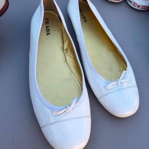 White Prada flats